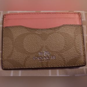 Vintage Coach pink and Coach imprint leather wallet with sleeves